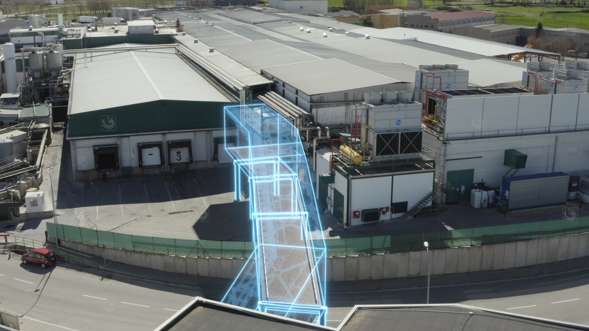 Fotograma mostrando la integración de elementos arquitectónicos 3D sobre metraje de vídeo real