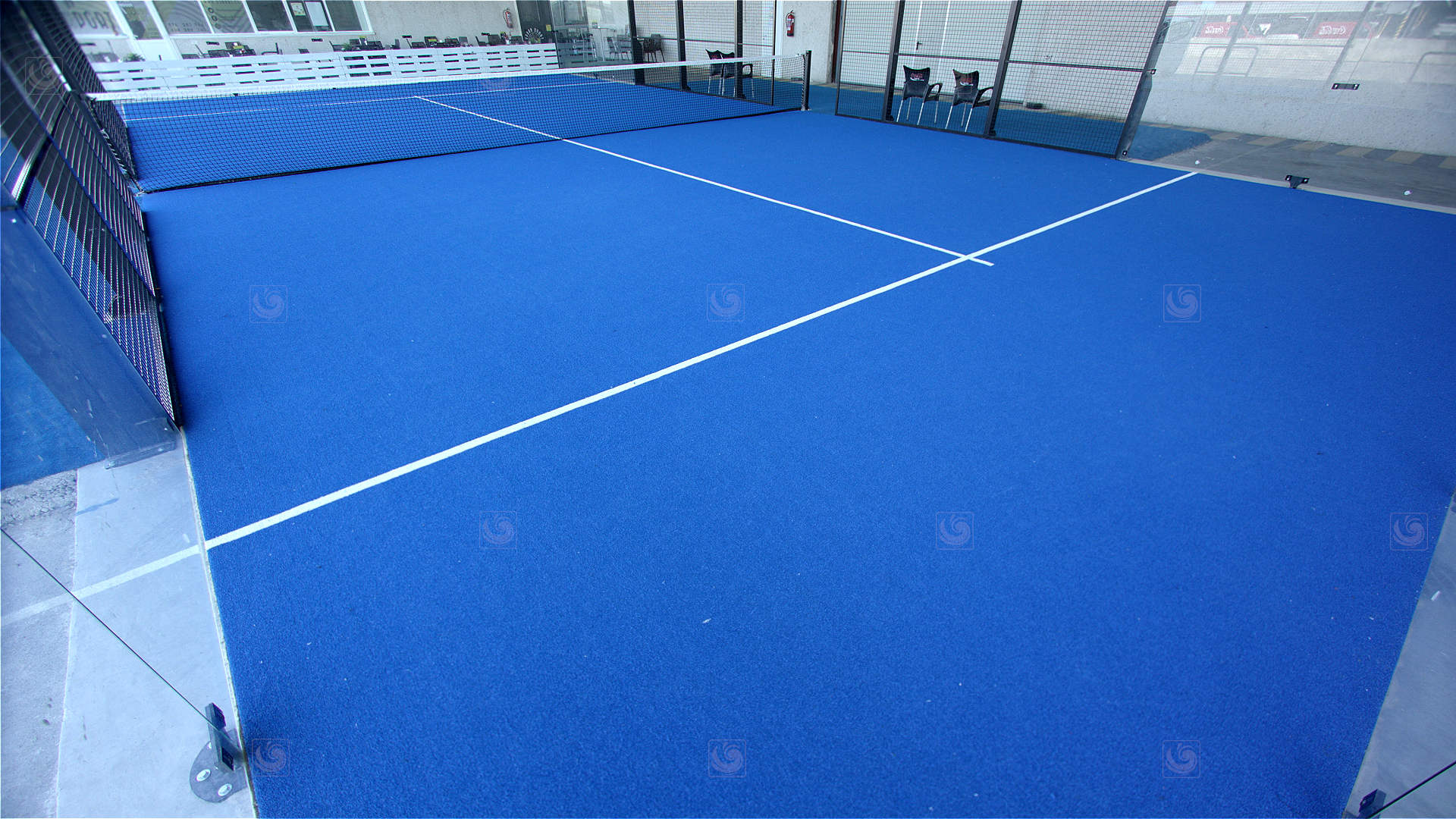 Videoframe showing a Mondo paddle tennis court